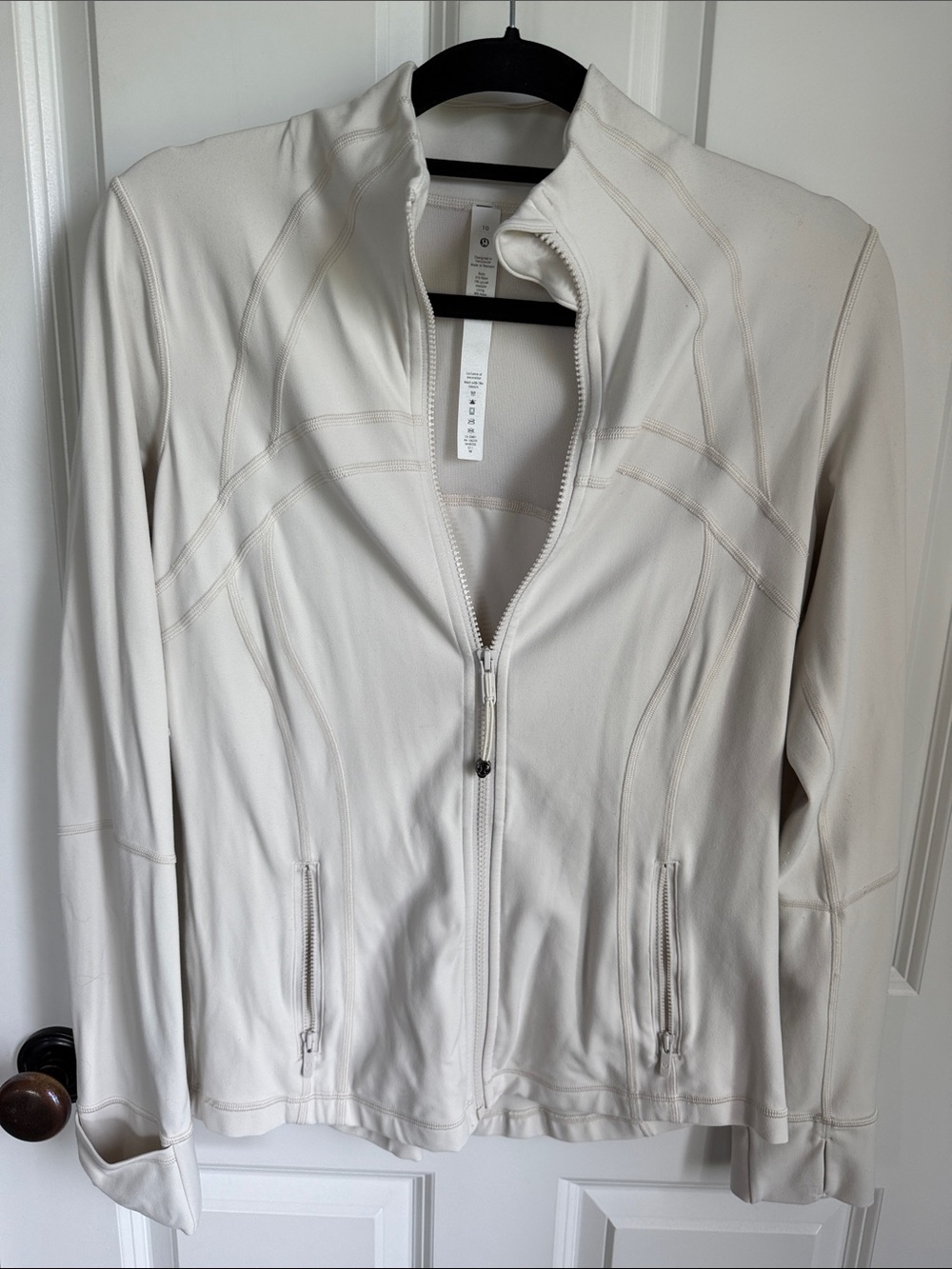 Lulu Lemon Size 10  Cream Women's Full-Zip Utility Jacket with cuff sleeves.